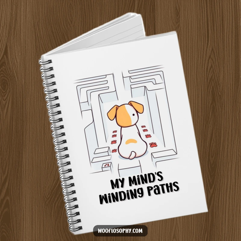 Funny dog contemplating a maze, paw prints on the cover of a notebook.