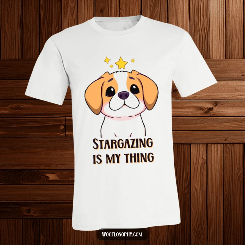 Funny t-shirt featuring a dog looking up at a starry sky with a thoughtful expression, capturing wonder and humor.